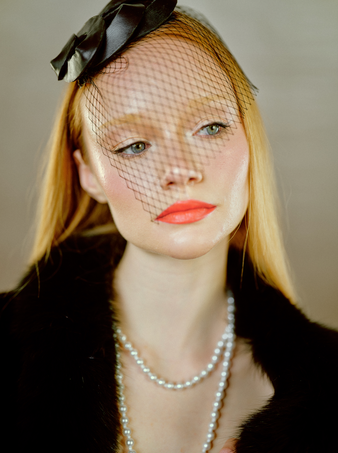 Fermata Veil by BIENBIE, delicate sheer veil with intricate lace details, draped elegantly for a bridal or special occasion look.