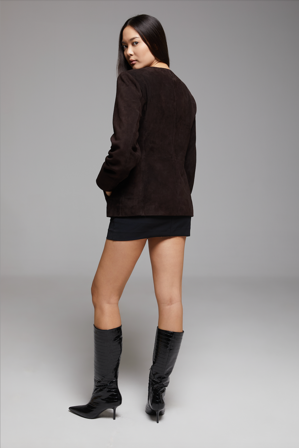 BIENBIE Concerto Jacket shown in the image, featuring a stylish, modern design with a focus on the jacket's fabric and fit.