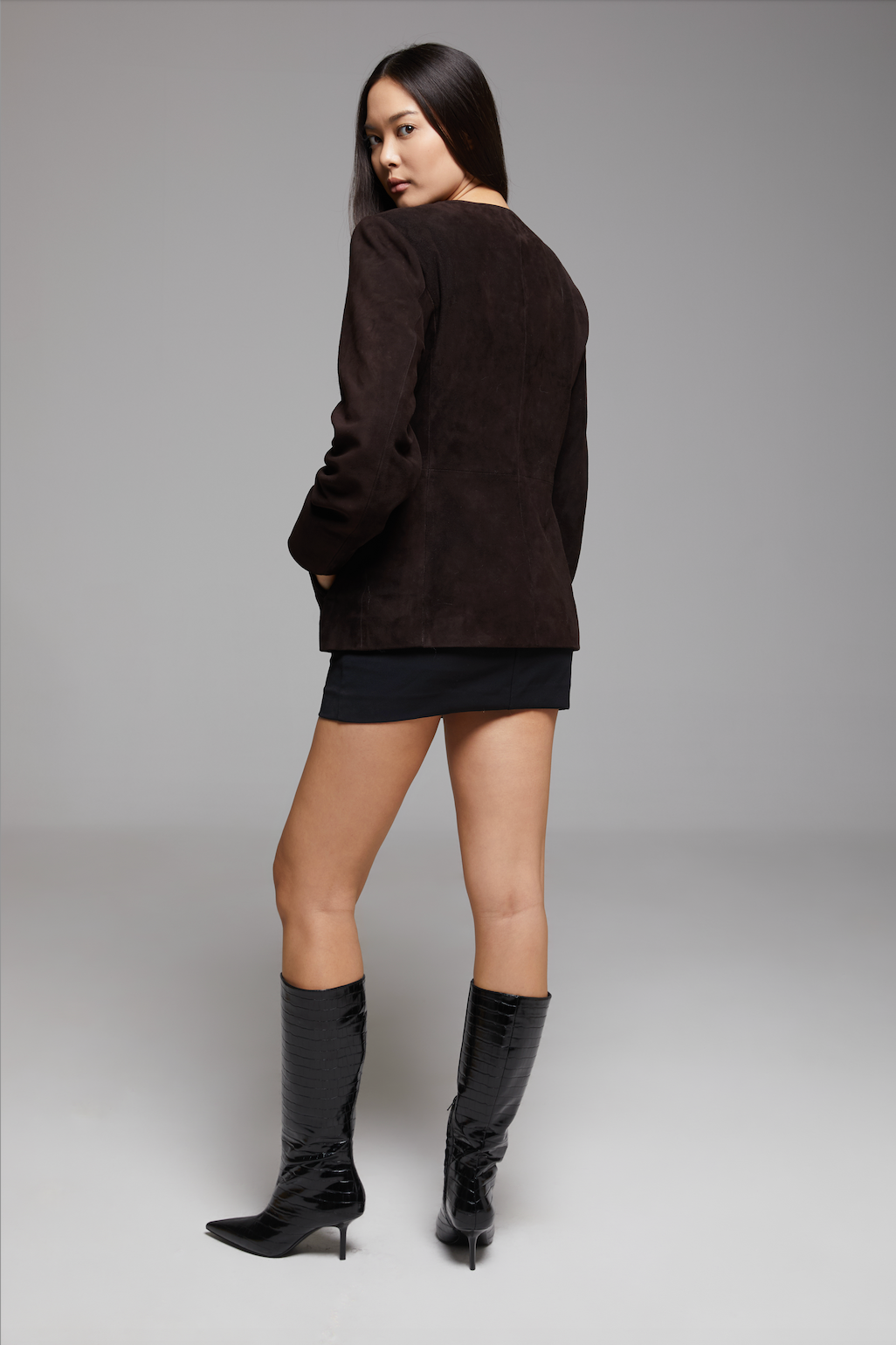 BIENBIE Concerto Jacket shown in the image, featuring a stylish, modern design with a focus on the jacket's fabric and fit.