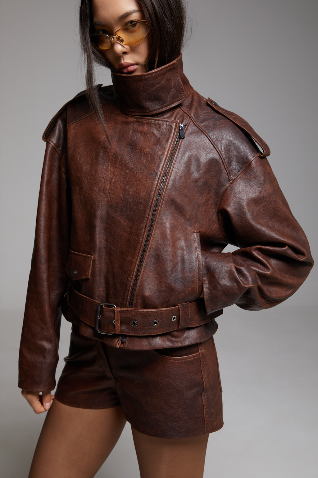 BIENBIE Funnel Neck Rondo Jacket, gray with a high funnel collar and zip closure, shown on a hanger