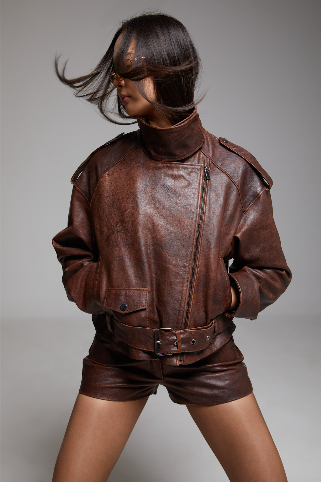 BIENBIE Funnel Neck Rondo Jacket in dark fabric, featuring a high funnel collar, front zipper, and stylish design.