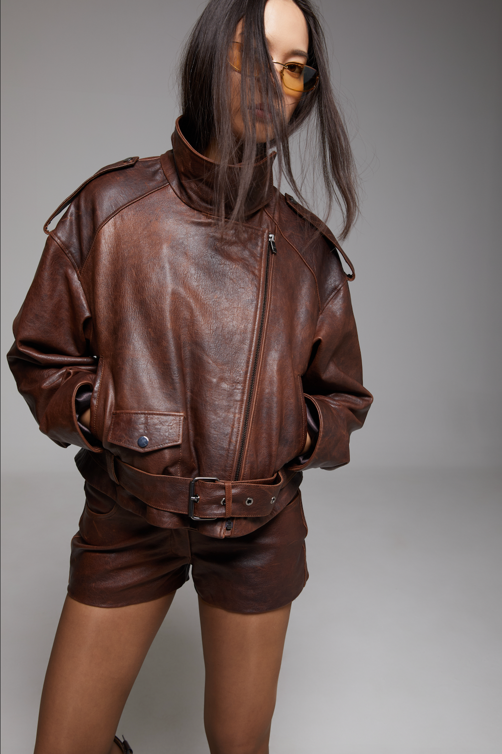 BIENBIE Funnel Neck Rondo Jacket shown on a model, featuring a high neckline and stylish design, perfect for cold weather.