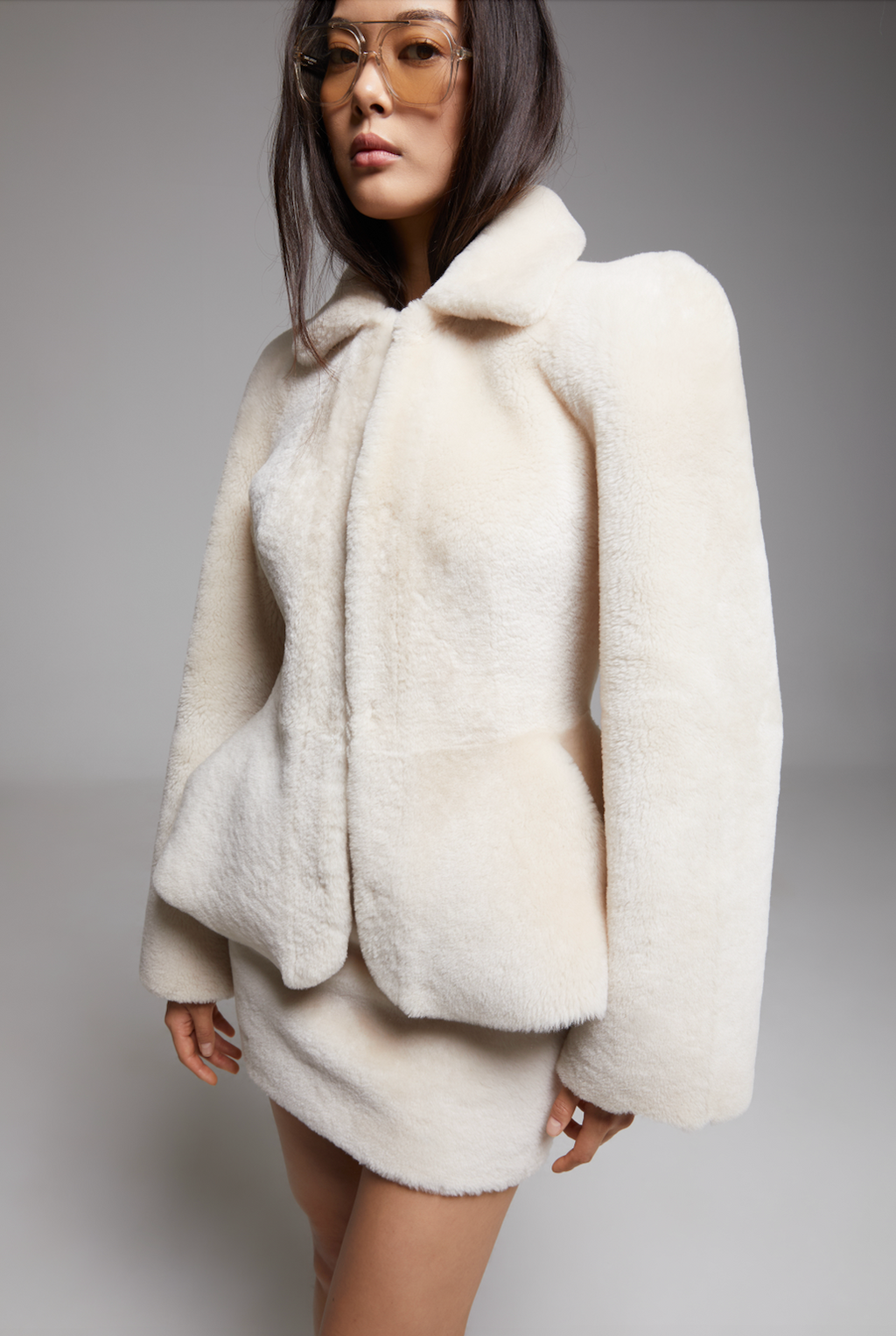 Allegro Coat by BIENBIE displayed on a screen, showcasing a stylish, well-fitted outerwear piece with a classic design.