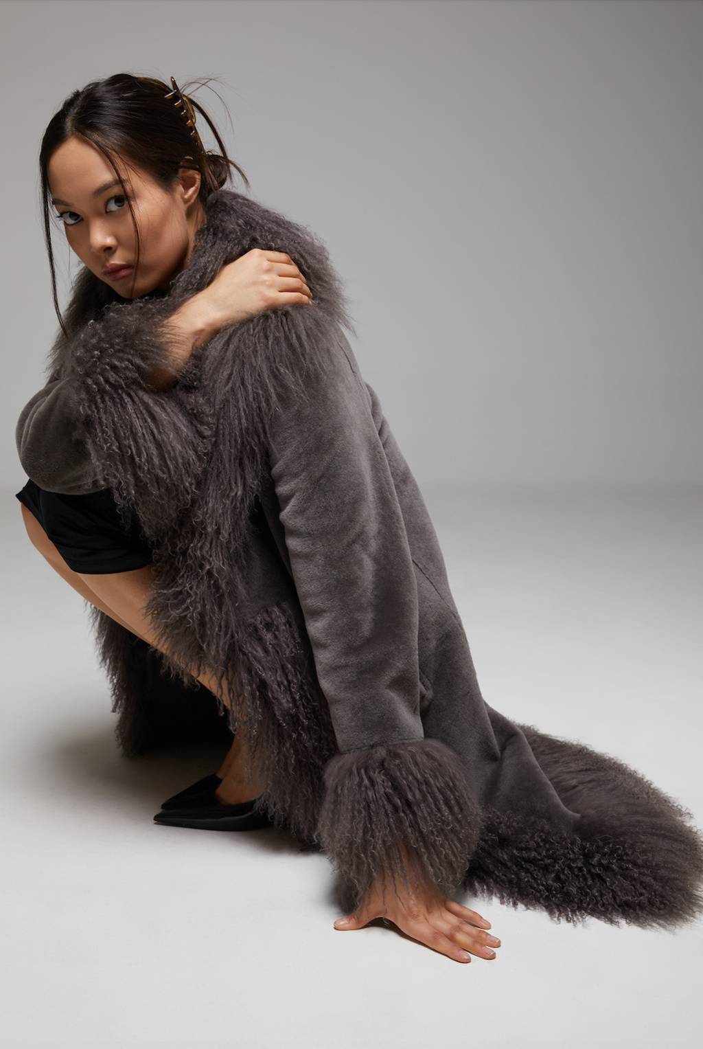 BIENBIE Waltz The Grand Coat in stylish fabric, shown hanging on a rack with detailed close-up of the elegant design.