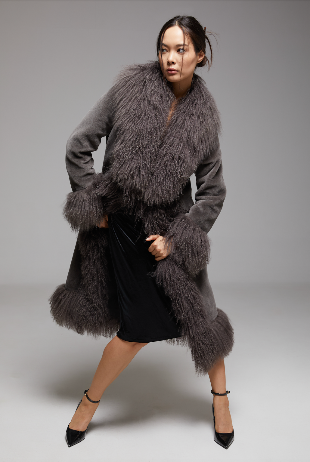 WALTZ The Grand Coat by BIENBIE displayed in a screenshot, showcasing a stylish, elegant outerwear piece with detailed fabric texture.