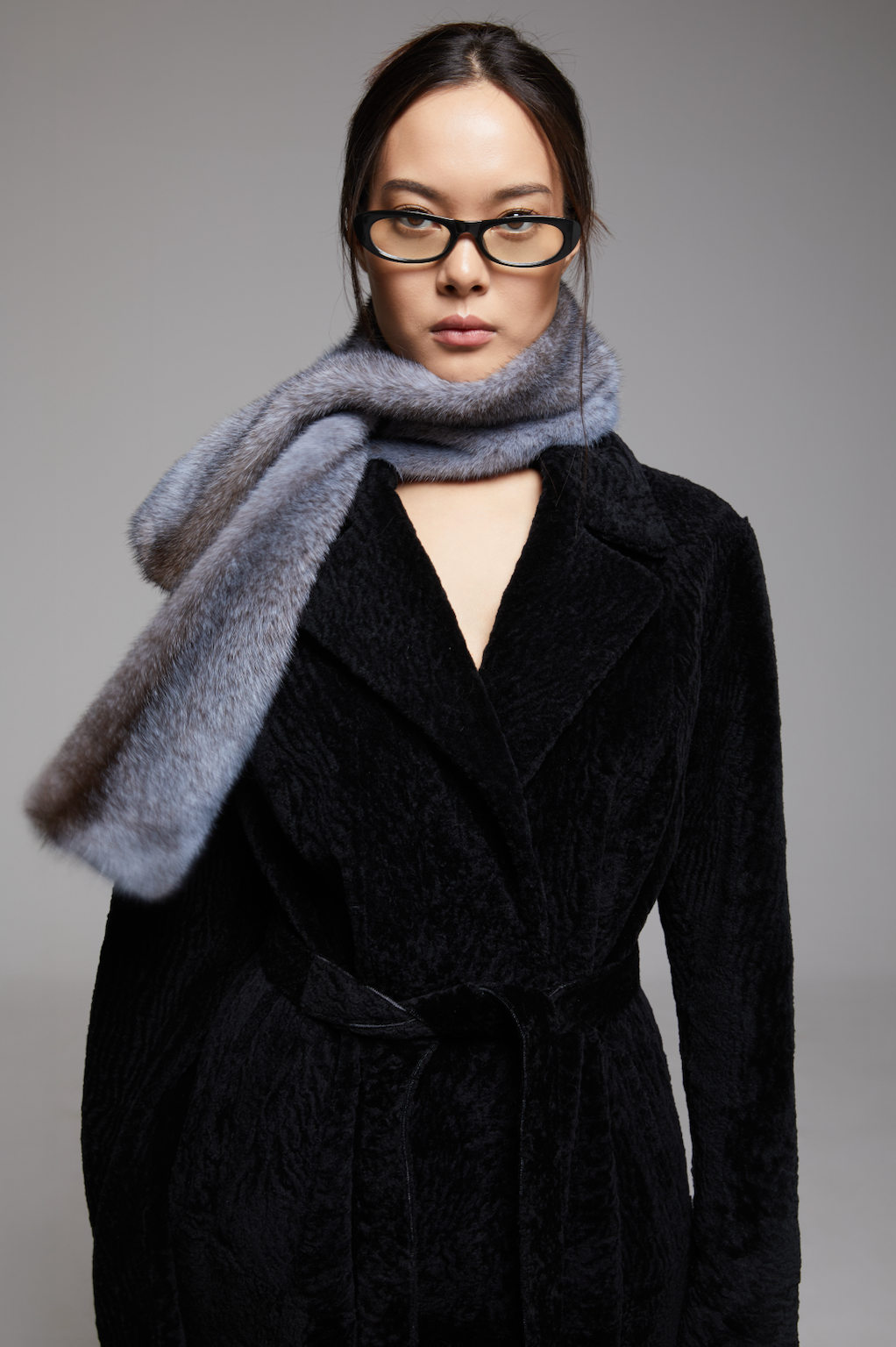 BIENBIE Rubato scarf featuring a stylish pattern and soft fabric, displayed in a close-up image.
