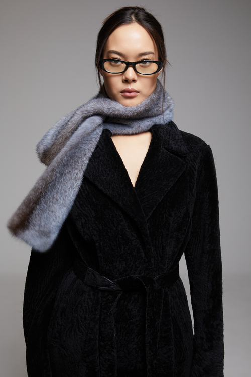 BIENBIE Rubato scarf featuring a stylish pattern and soft fabric, displayed in a close-up image.