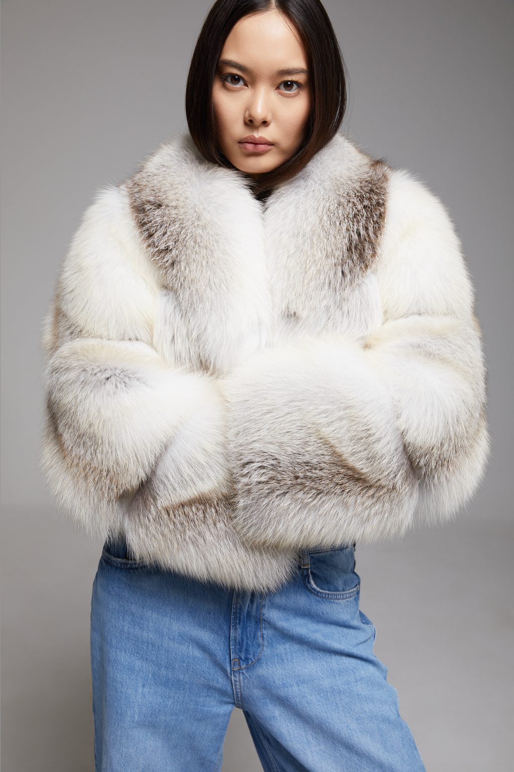 BIENBIE Aria Coat displayed on a hanger, showcasing its stylish design and tailored fit in a neutral color.