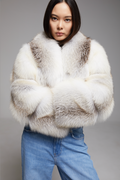 BIENBIE Aria Coat displayed on a hanger, showcasing its stylish design and tailored fit in a neutral color.