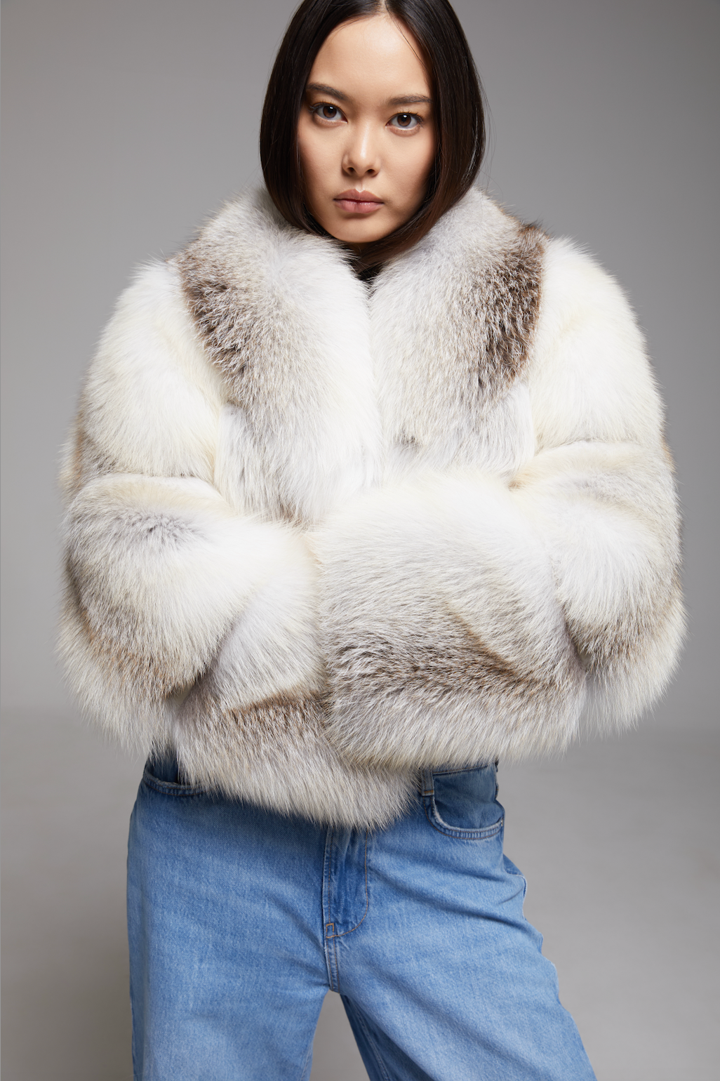 BIENBIE Aria Coat displayed on a hanger, showcasing its stylish design and tailored fit in a neutral color.