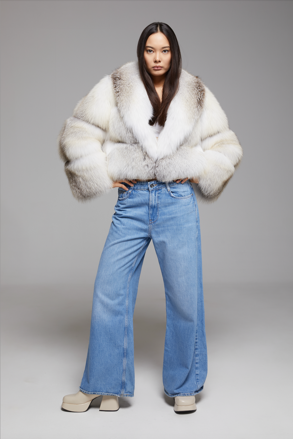 BIENBIE Aria Coat displayed in a screenshot, showcasing a stylish, tailored coat with a sleek design and classic silhouette.