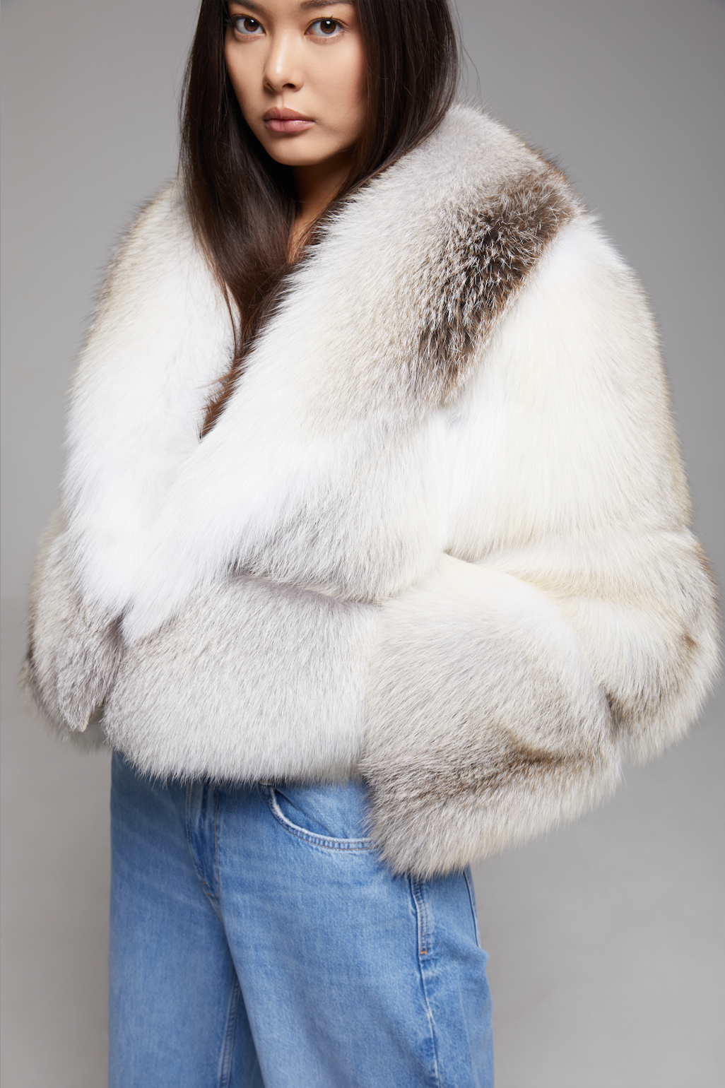 BIENBIE Aria coat in neutral fabric, shown on a hanger with a tailored fit and stylish collar detail.