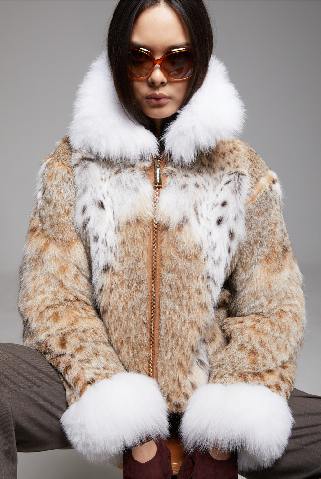 BIENBIE Intermezzo coat shown in a screenshot, featuring a stylish, lightweight outerwear design with a modern silhouette.