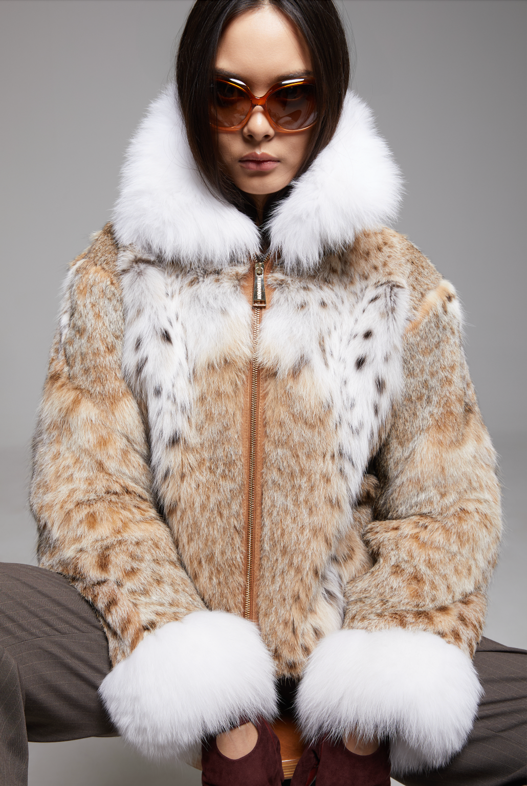 BIENBIE Intermezzo coat shown in a screenshot, featuring a stylish, lightweight outerwear design with a modern silhouette.